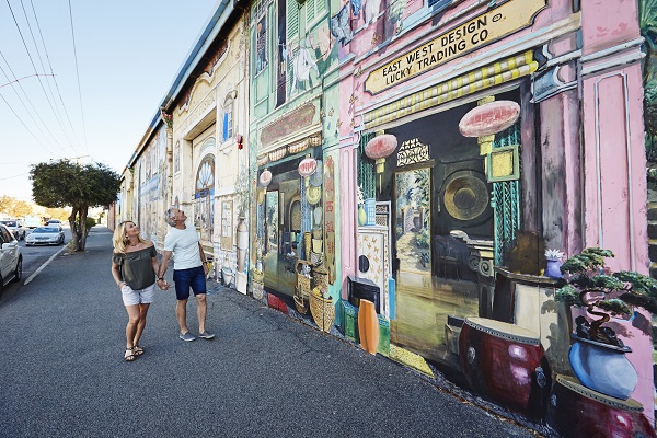 A couple enjoying the unique Perth street art